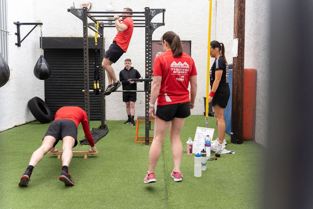 A group of people working out in a gym